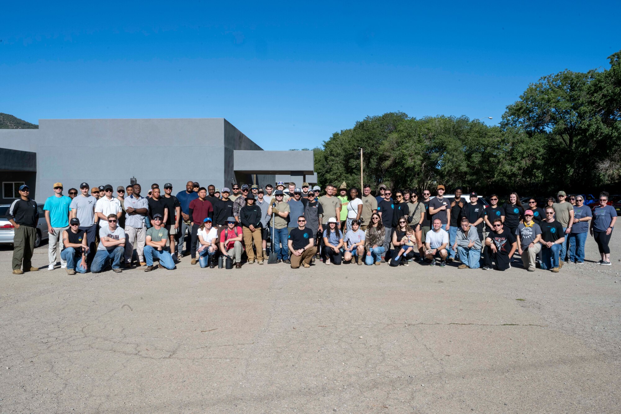 Members of Team Holloman, the 7th Air Support Operations Squadron and community members pose for a photo at Mescalero, New Mexico, July 19, 2025.