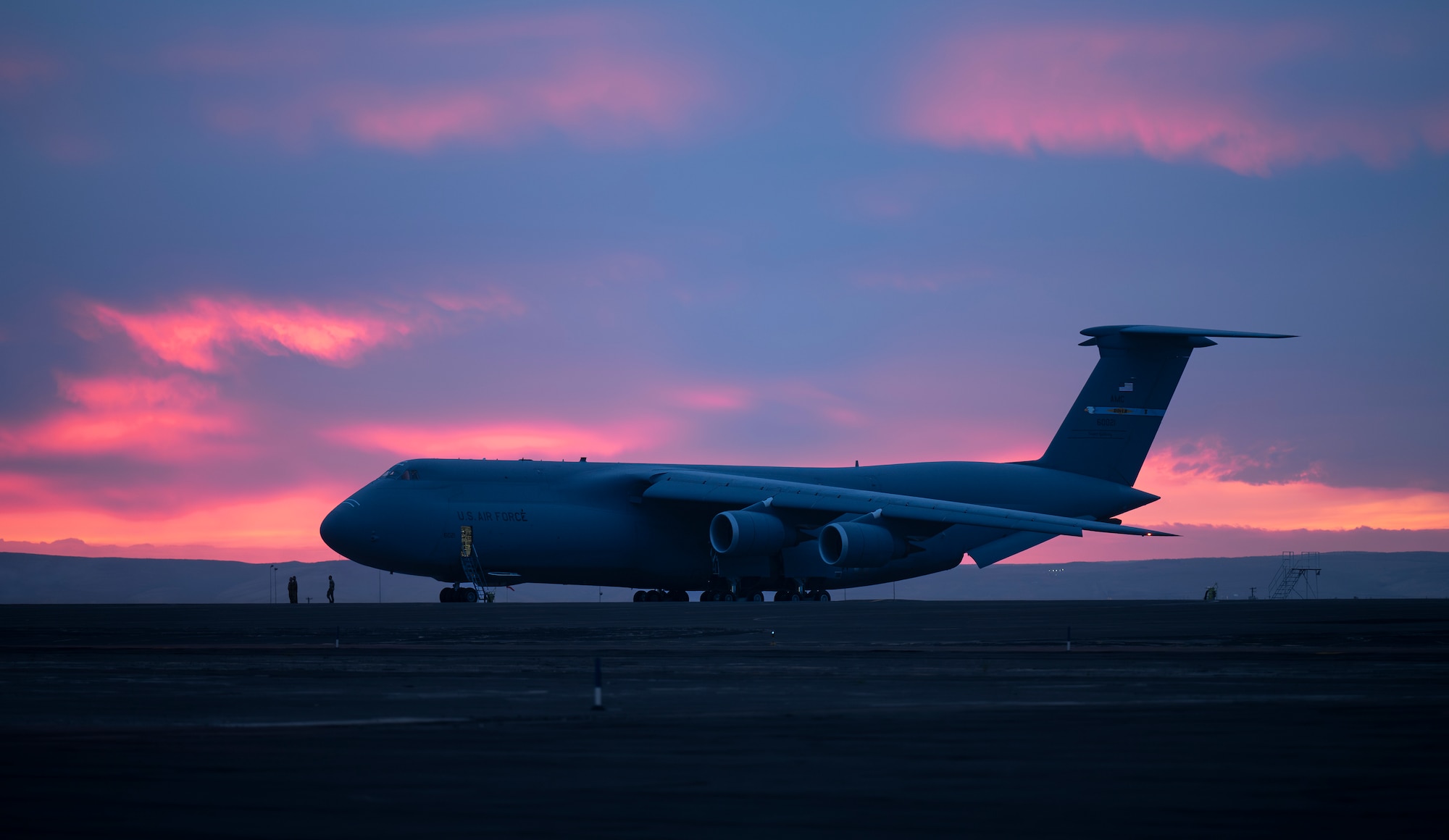 C-5M Super Galaxy aircraft at sunset