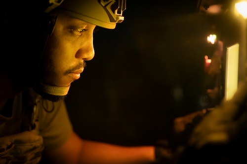 Airman works on generator