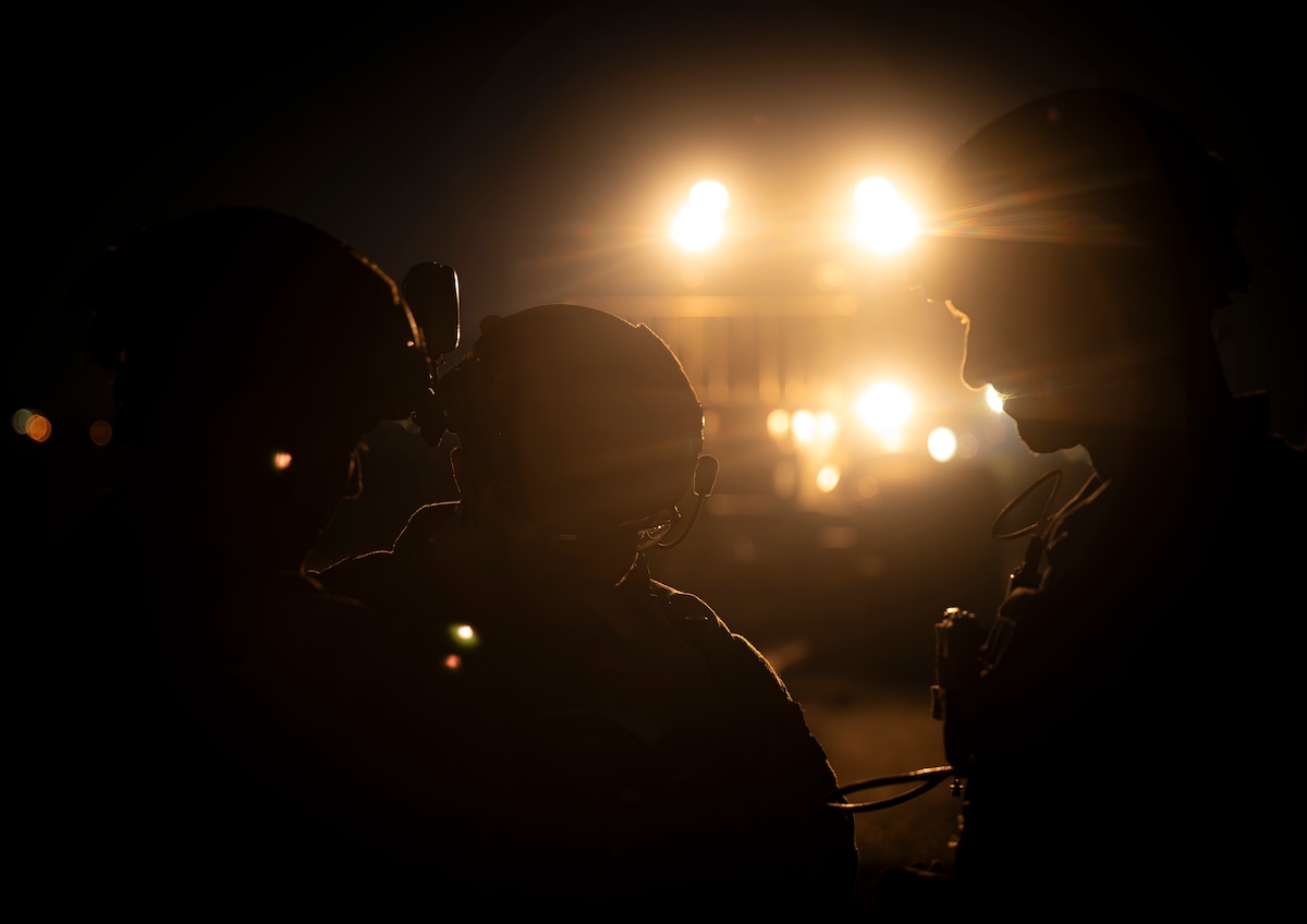 Airman work together
