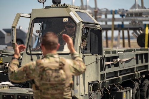 Airmen work together