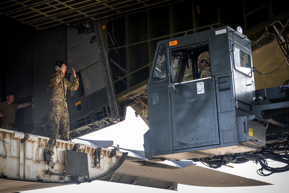 Airmen work together