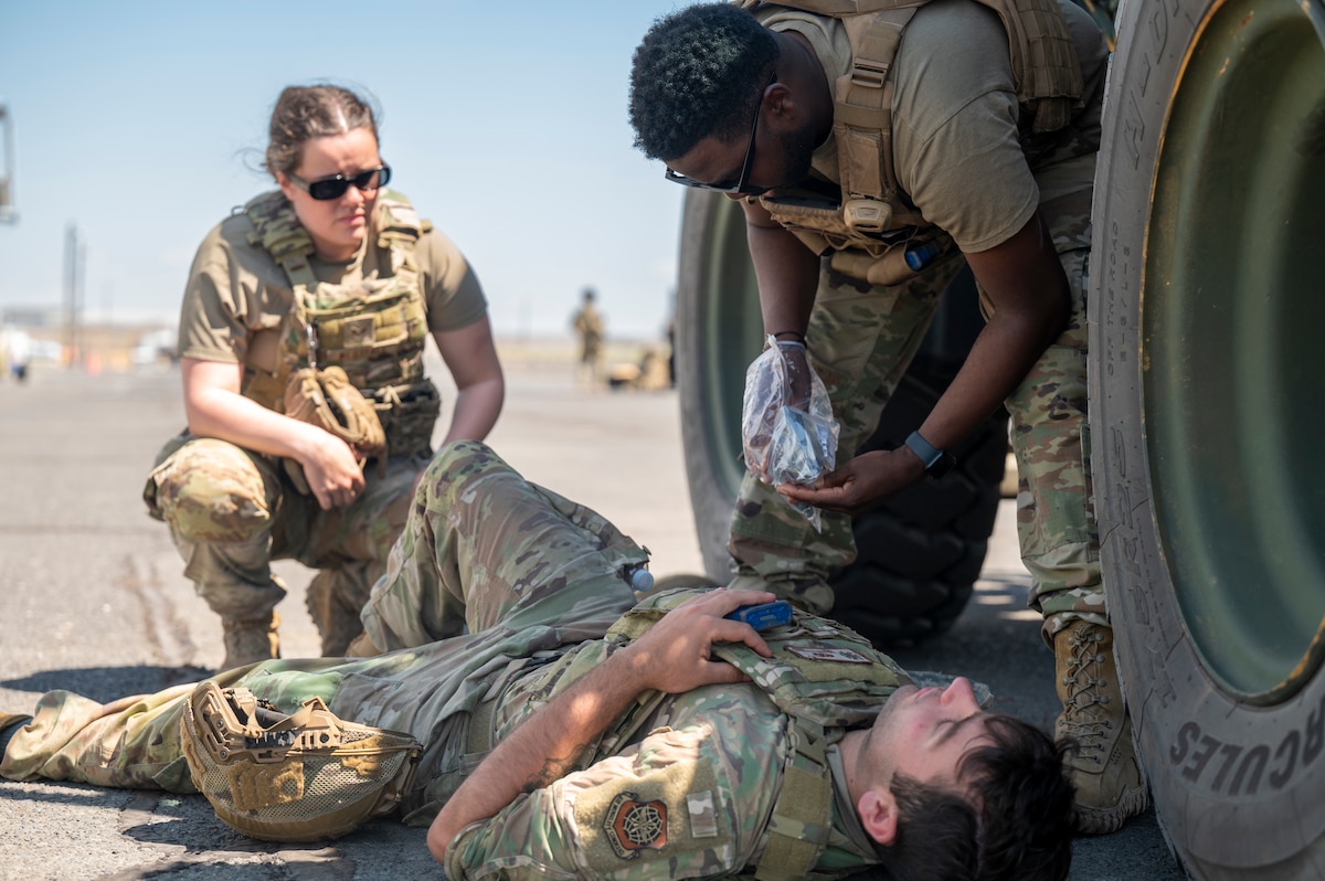 Airmen work on field medical care