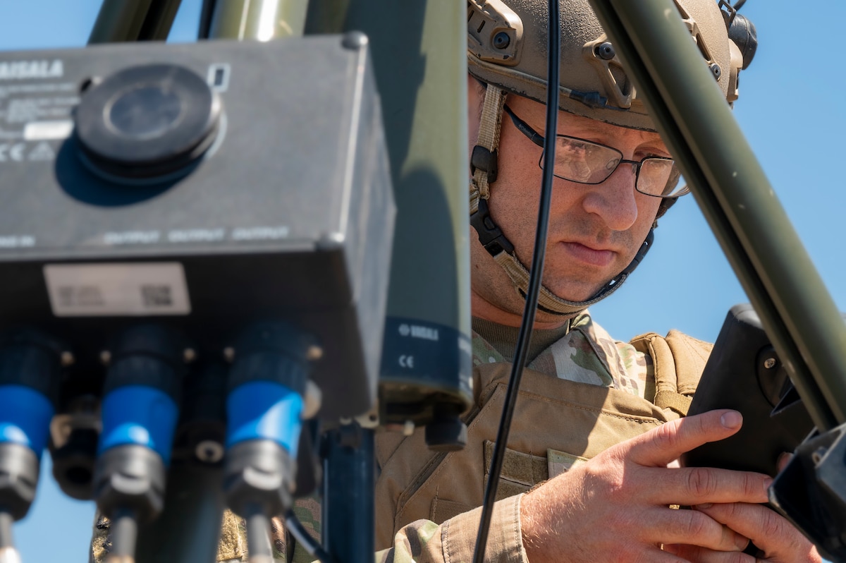 Airman sets up portable weather station