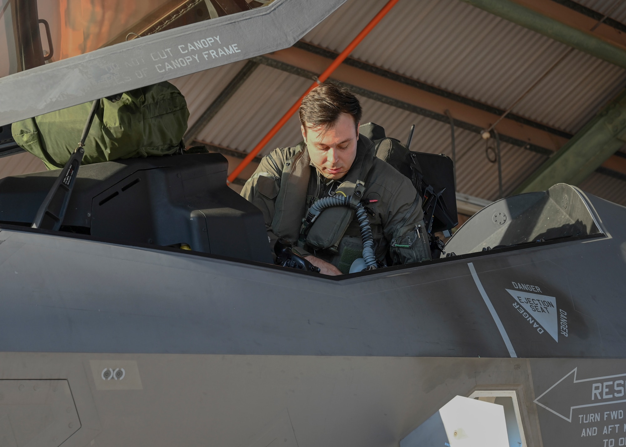U.S. Air Force Maj. Colby “Burn” Kluesner, 388th Fighter Wing F-35A Lightning II evaluator pilot, conducts preflight checks on a Royal Australian Air Force F-35A Lightning II aircraft during Talisman Sabre 25 in Northern Territory, Australia, July 16, 2025. Talisman Sabre is the largest bilateral military exercise between Australia and the United States, that advances a safe and secure Indo-Pacific by strengthening relationships and interoperability among key allies and partners, while enhancing our collective capabilities to respond to a wide array of potential security concerns. (U.S. Air Force photo by Airman 1st Class Joseph Maye)