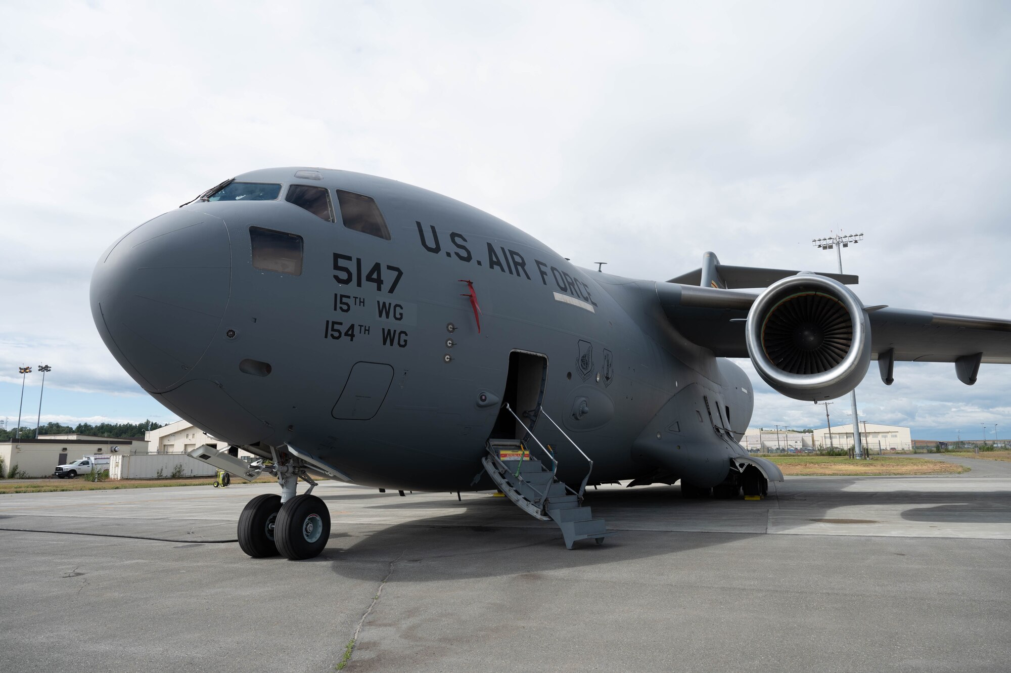 A C-17 parked on a flightline.