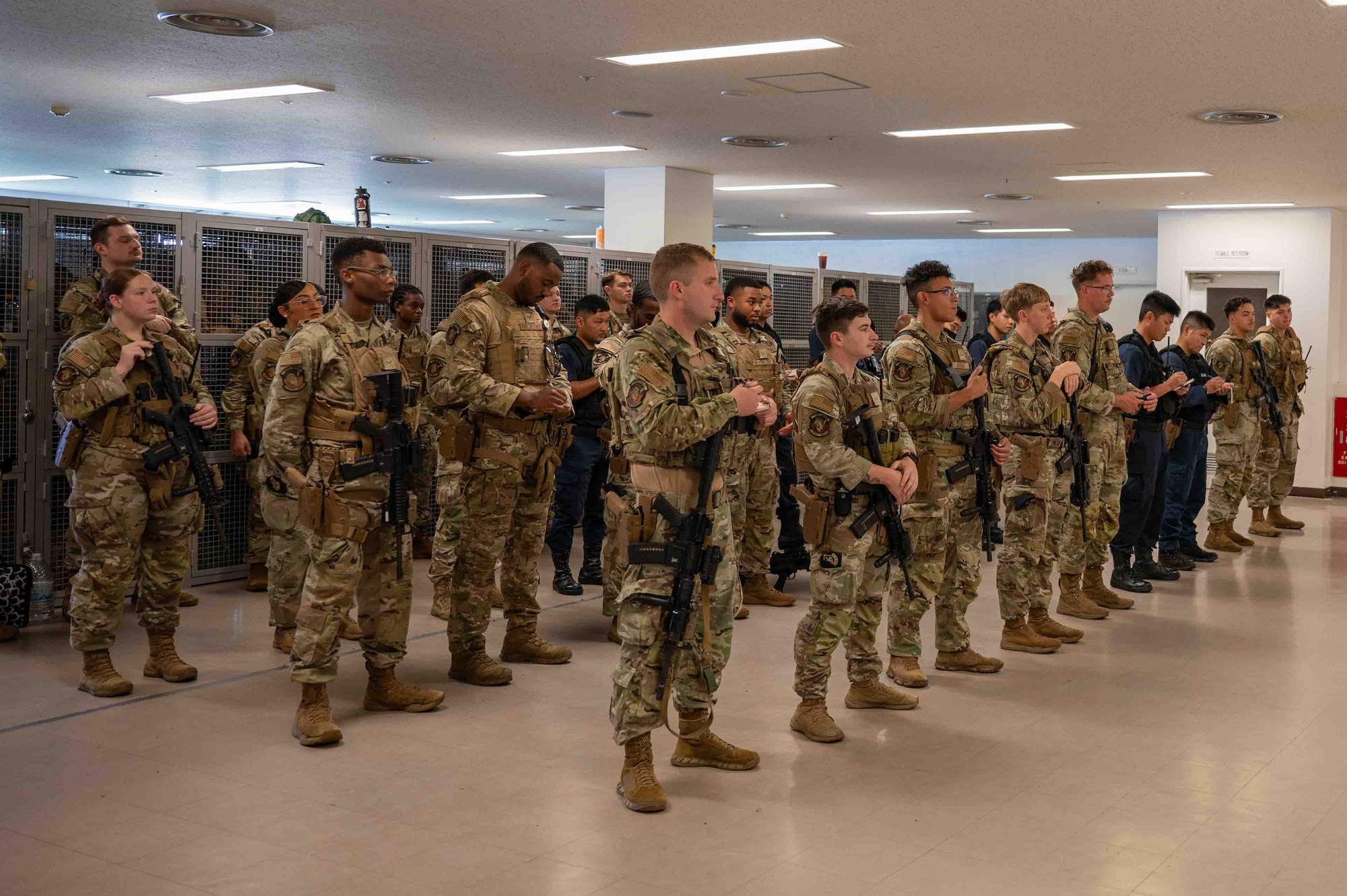 military members stand in a row