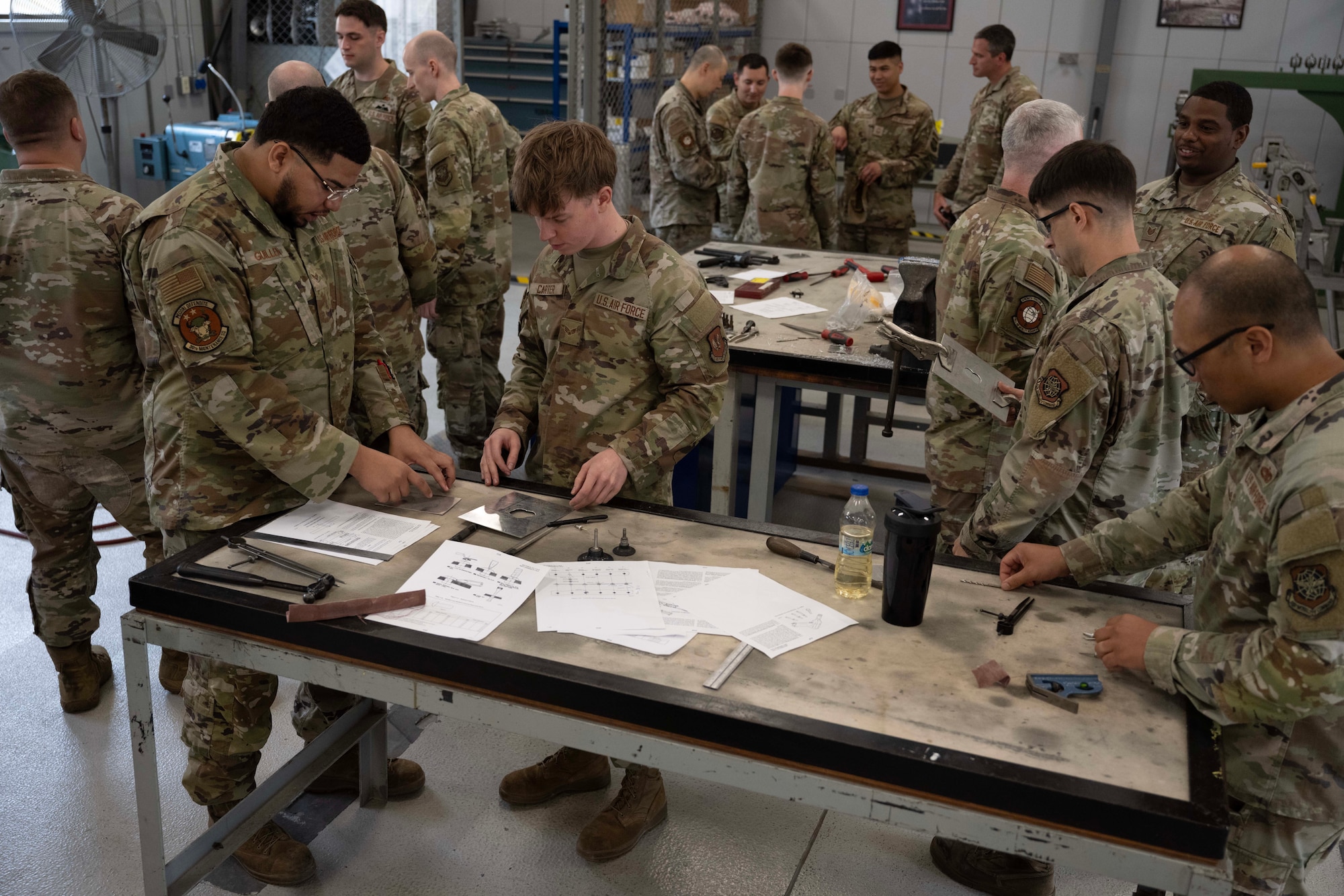 U.S. Air Force Airmen from the 39th Maintenance Squadron and 728th Air Mobility Squadron perform hands-on training at Incirlik Air Base, Türkiye, July 16, 2025. The scenario allows maintainers to practice repair techniques used to return damaged aircraft to operational status. (U.S. Air Force photo by Senior Airman Greydon Furstenau)