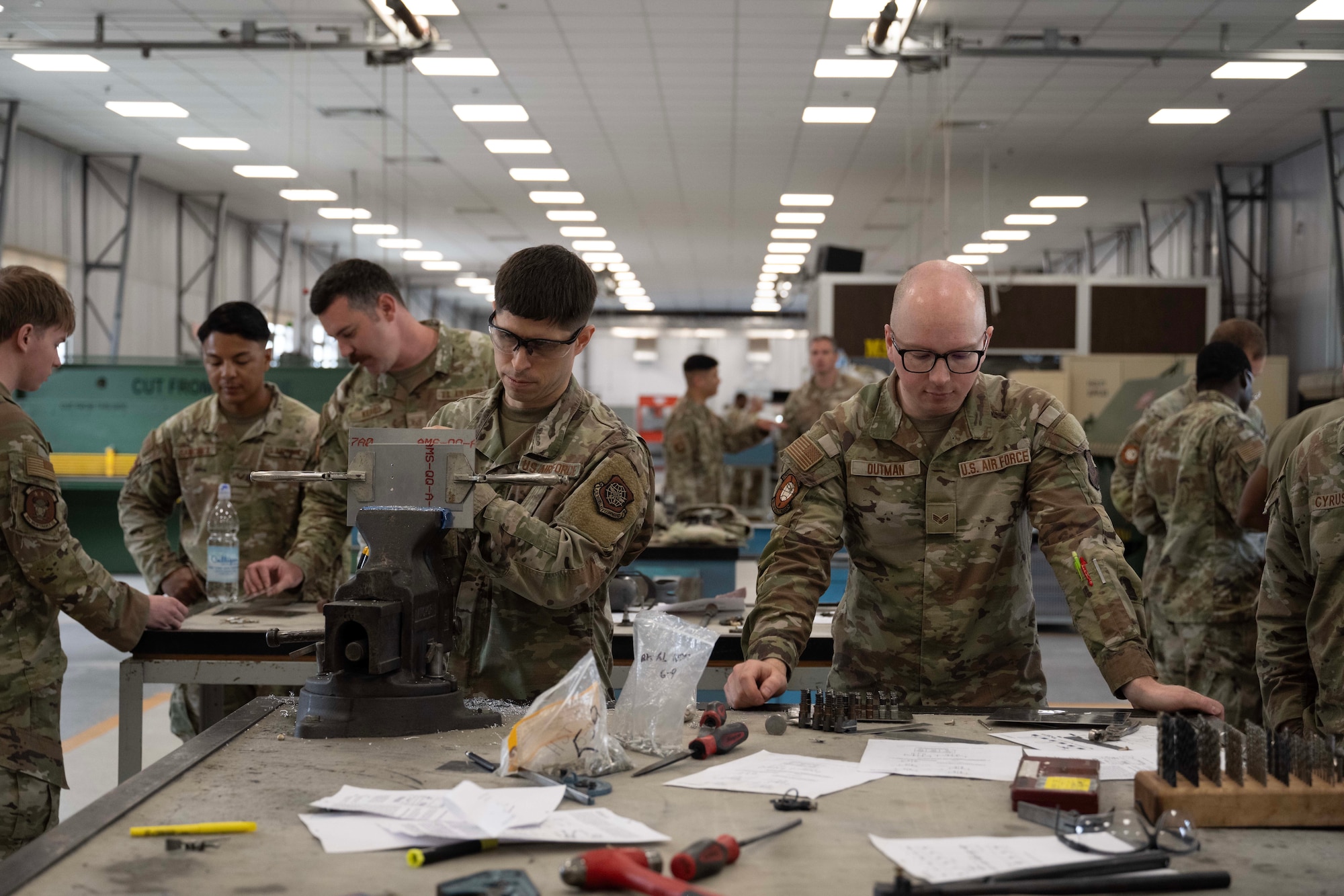 U.S. Air Force Airmen from the 39th Maintenance Squadron and 728th Air Mobility Squadron perform hands-on training during Aircraft Battle Damage Repair Evaluation at Incirlik Air Base, Türkiye, July 16, 2025. The scenario allows maintainers to practice repair techniques used to return damaged aircraft to operational status.