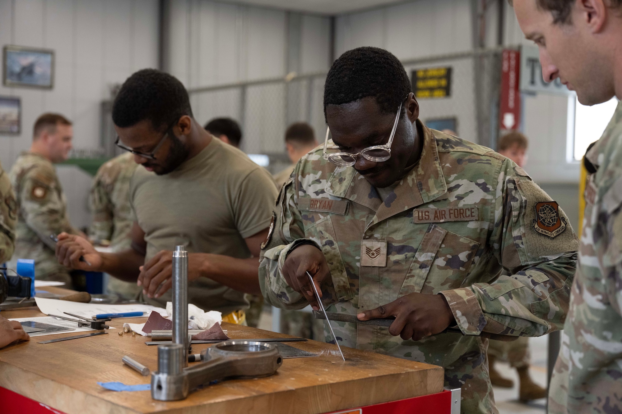 U.S. Air Force Staff Sgt. Camerin Bryan, 728th Air Mobility Squadron transient aircraft craftsman, performs hands-on training at Incirlik Air Base, Türkiye, July 16, 2025. The course enhances maintenance readiness by teaching Airmen how to identify, assess, and repair simulated battle damage