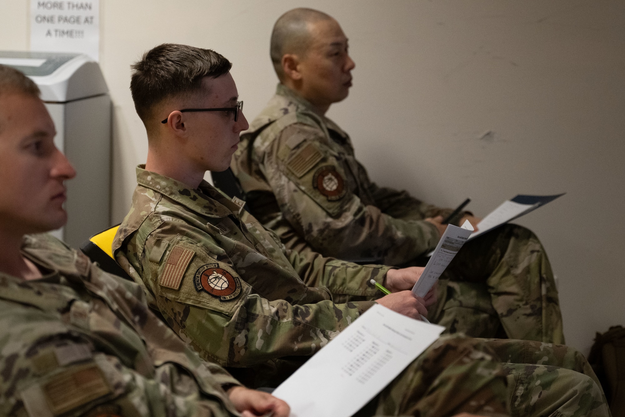 U.S. Air Force Tech. Sgt. Brian Pak, 728th Air Mobility Squadron transient aircraft noncommissioned officer in charge, and Staff Sgt. Christopher Scarpato, 728th AMS transient aircraft craftsman, takes part in Aircraft Battle Damage Repair Evaluation training at Incirlik Air Base, Türkiye, July 15, 2025. The course combines classroom instruction and hands-on application to prepare maintainers for recovery operations in contested environments.