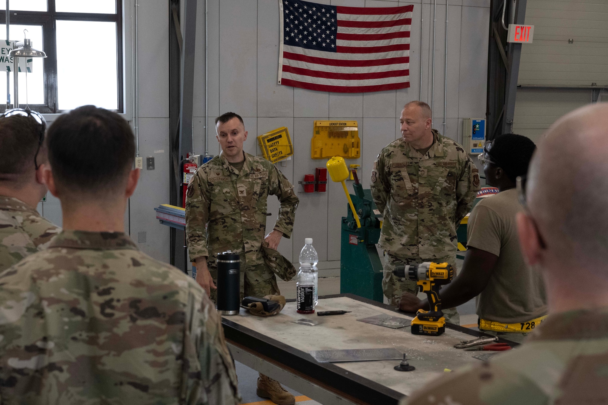 U.S. Air Force Col. John Szczepanski, 39th Weapons System Security Group commander, and Chief Master Sgt. William Hensley, WSSG senior enlisted leader, speaks with members of the 728th Air Mobility Squadron and 39th Maintenance Squadron at Incirlik Air Base, Türkiye, July 16, 2025. The engagement highlighted the importance of technical training and cross-unit collaboration in support of aircraft recovery operations.