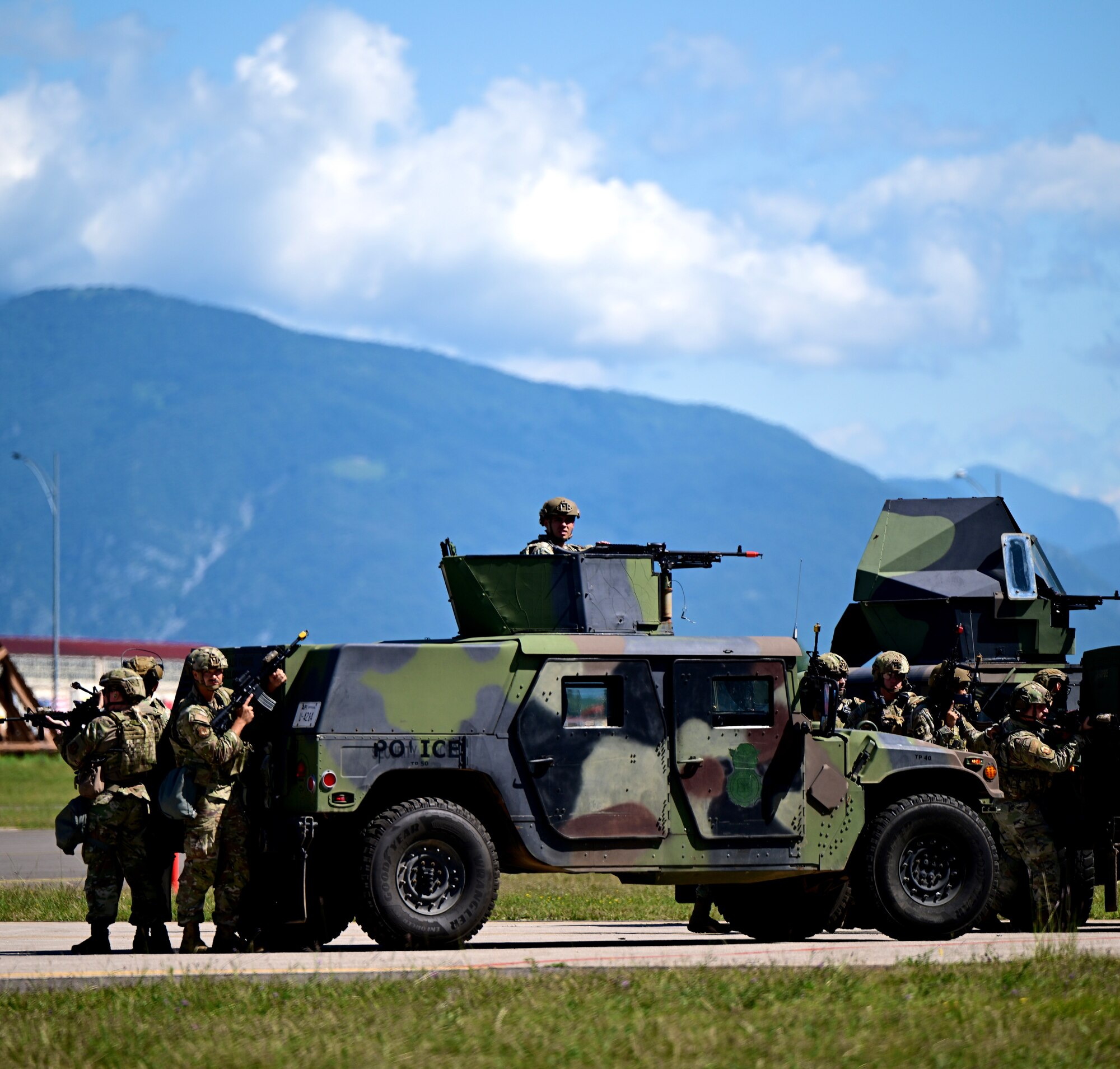 Airman prepare to fire at enemy personnel.