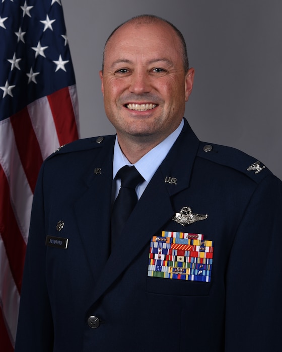 Air Force officer smiling in blues uniform