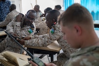 U.S. Soldiers assigned to the Kentucky Army National Guard participate in a radio communications knowledge exchange with Djiboutian soldiers at the Djiboutian signal corps compound in Djibouti City, Djibouti, July 14, 2025.