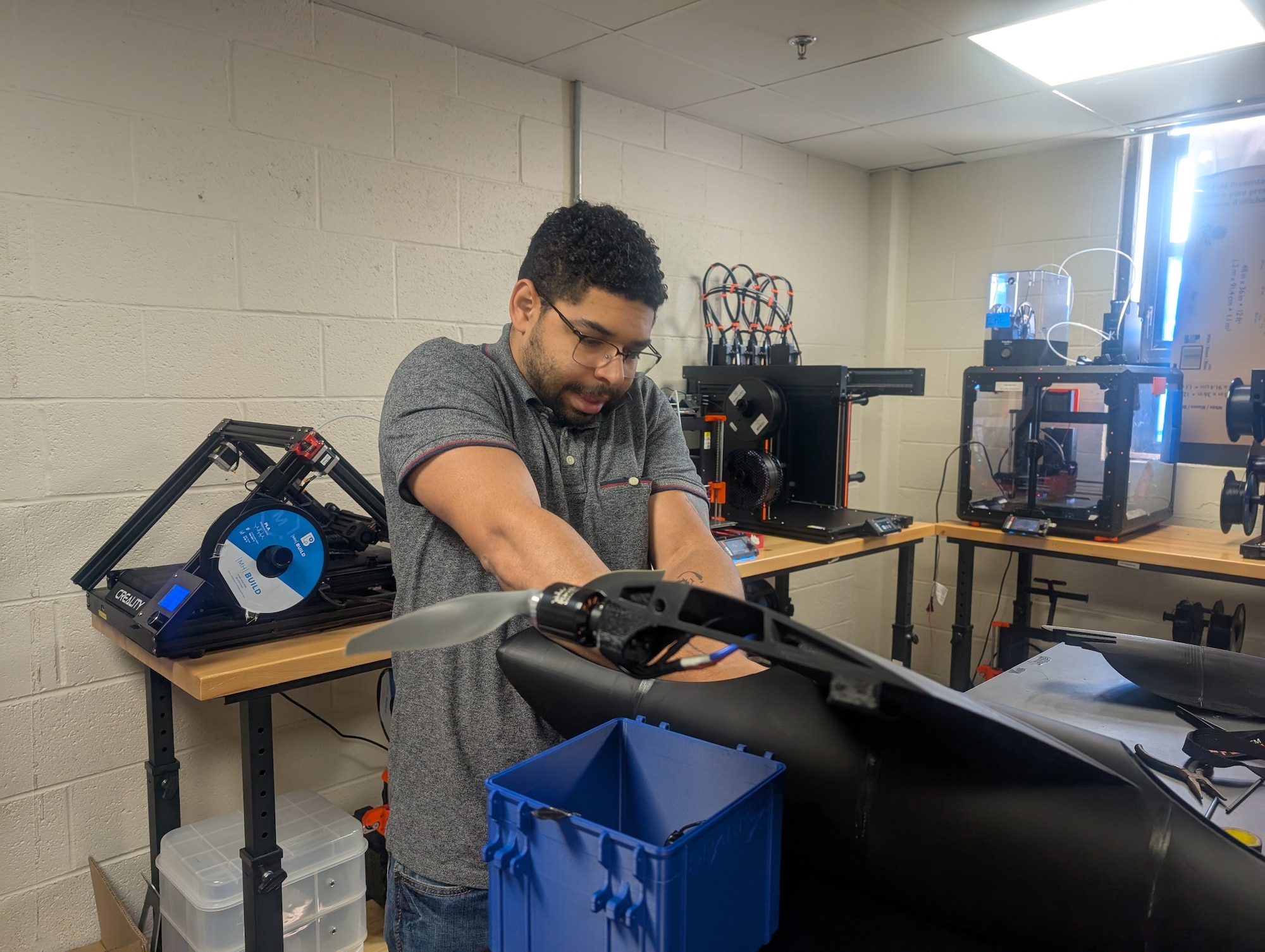 U.S. Air Force Staff Sgt. Stefan N. Sobiech, a SparkX Cell Innovation and Idea Center technician, assembles a Blackbird unmanned aircraft system in September 2024, at Joint Base Andrews, Md.  The SparkX team’s modular 3D-printed design enables rapid field assembly and mission-specific customization without the need for specialized tools.