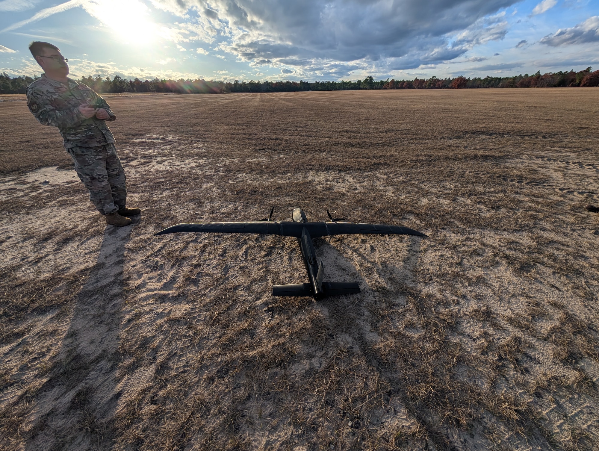 U.S. Air Force Staff Sgt. Chad Bohr, a SparkX Cell Innovation and Idea Center technician from Joint Base Andrews, Md., readies a Blackbird drone before a demonstration during Titan Hoplite at Shaw Air Force Base, S.C. The drone’s fuselage and wings were 3D printed by the SparkX team in response to a request from the U.S. Army’s 1st Multi-Domain Task Force out of Joint Base Lewis-McChord, Wash.