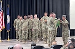 The Virginia National Guard’s Hanover-based 229th Military Police Company, 276th Engineer Battalion, 329th Regional Support Group takes responsibility for a U.S. Central Command customs operations mission from the Missouri National Guard’s 1175th MP Company, 205th MP Battalion during a transfer of authority ceremony July 6, 2025, at Camp Arifjan, Kuwait. More than 100 Soldiers assigned to the 229th arrived in the CENTCOM area of operations and began conducting customs operations by July 4.