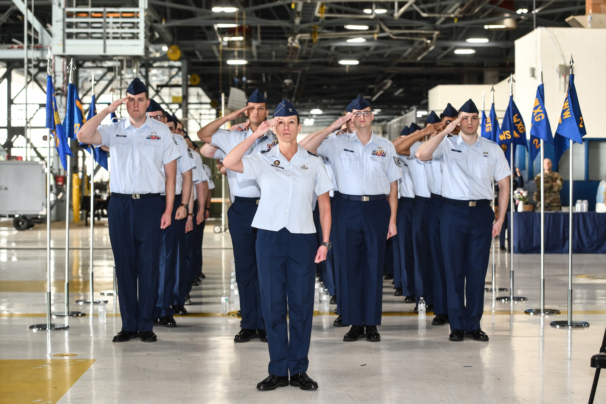 Members of the 557th Weather Wing render a first salute to Col. Hank Chilton, 557th Weather Wing commander, during his assumption of command ceremony at Offutt Air Force Base, July 22, 2025. (U.S. Air Force photo by Chad Watkins)