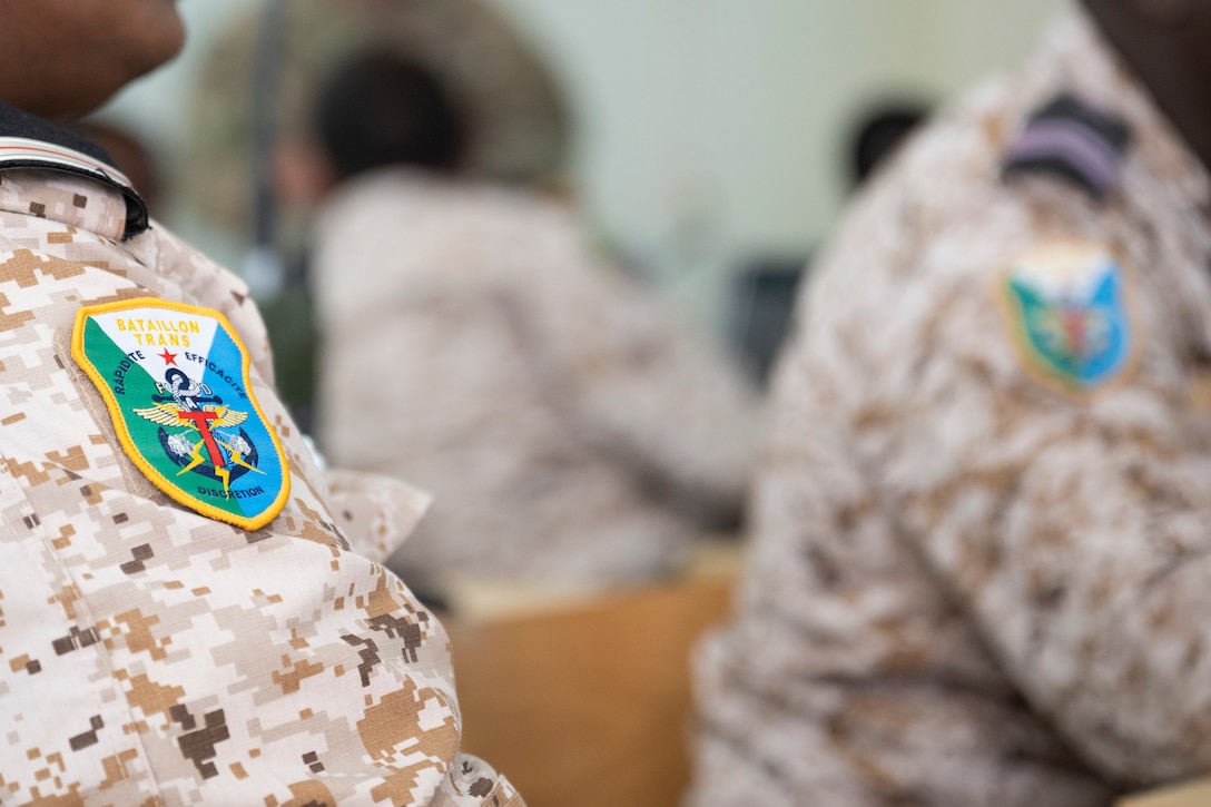 Soldiers assigned to the Kentucky Army National Guard participate in a radio communications knowledge exchange with Djiboutian soldiers at the Djiboutian signal corp compound in Djibouti City, Djibouti, July 14, 2025.