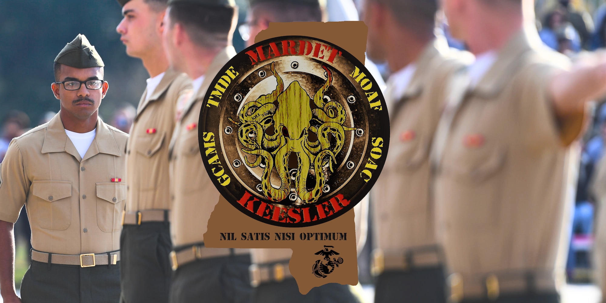 An emblem over Marines.