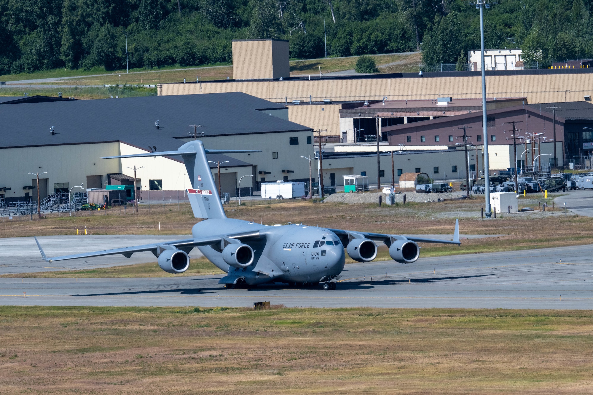 A U.S. Air National Guard C-17 Globemaster III aircraft assigned to the 155th Airlift Squadron, Tennessee Air National Guard, taxis for takeoff during exercise Resolute Force Pacific on Joint Base Elmendorf-Richardson, Alaska, July 13, 2025.