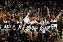 Team Army celebrates after winning the wheelchair basketball gold medal at the 2025 Department of Defense Warrior Games in Colorado Springs Colorado, July 20, 2025.