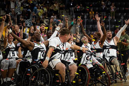 Team Army celebrates after winning the wheelchair basketball gold medal at the 2025 Department of Defense Warrior Games in Colorado Springs Colorado, July 20, 2025.