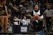 U.S. Army Capt. Carlos Rivera prepares to take a free throw during the wheelchair basketball gold medal game against Team SOCOM at the 2025 Department of Defense Warrior Games in Colorado Springs Colorado, July 20, 2025.