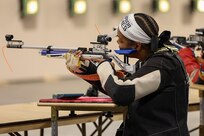 U.S. Army Cpt. Channda Mitchell fires her air rifle during the precision air event at the 2025 Department of Defense Warrior Games in Colorado Springs, Colorado, July 21, 2025.