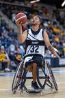 U.S. Army Retired Spc. Anthony Farve attempts a layup in the wheelchair basketball game against Team Navy during the 2025 Department of Defense Warrior Games at Colorado Springs, Colorado, July 20, 2025.