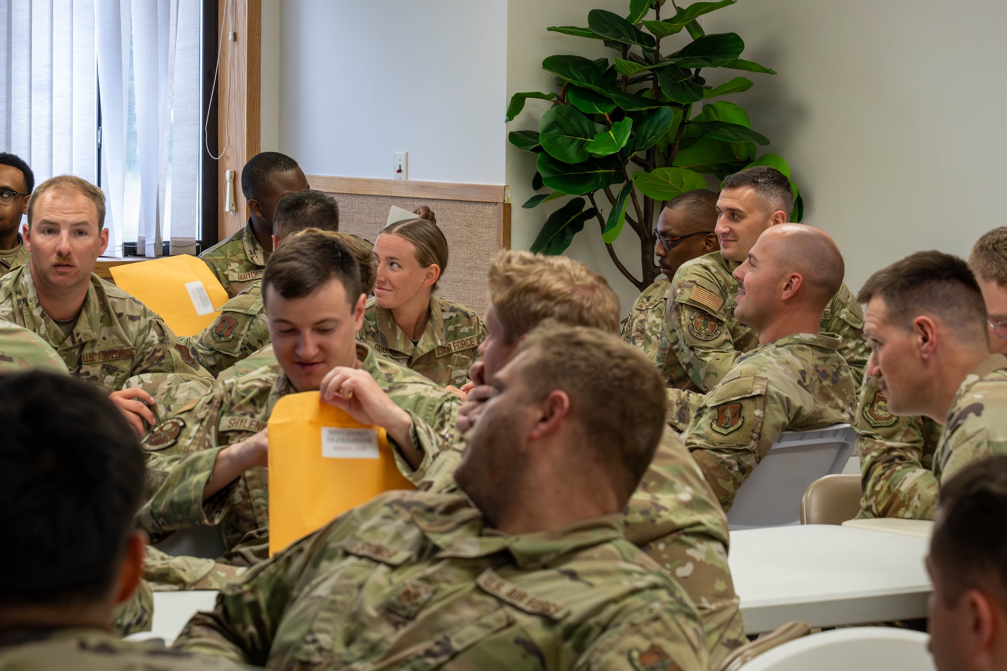 U.S. Air Force Airmen assigned to the Tennessee Air National Guard, receive a processing brief during exercise Resolute Forces Pacific 2025 at Joint Base Elmendorf-Richardson, Alaska, July 8, 2025.