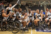 Team Army celebrates after securing a victory in wheelchair basketball during the 2025 Department of Defense Warrior Games at Ed Robson Arena, Colorado Springs, Colorado, July 19, 2025.