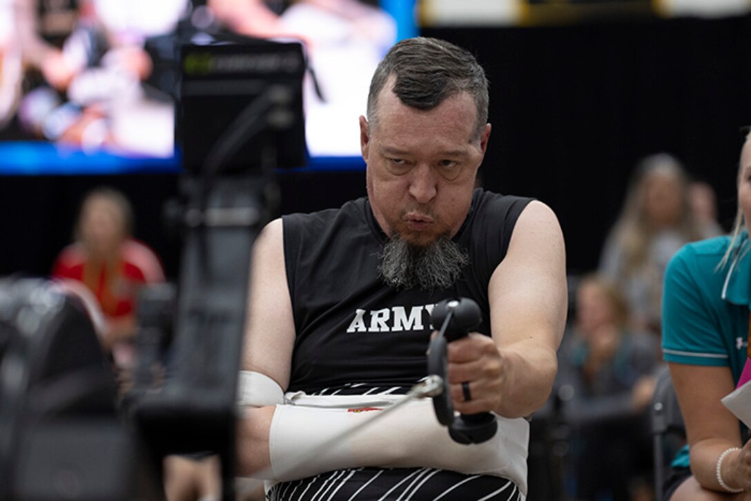 U.S. Army Retired Maj. Jeremy Ditlevson competes in the indoor rowing event during the 2025 Department of Defense Warrior Games at Colorado Springs, Colorado, July 21, 2025.