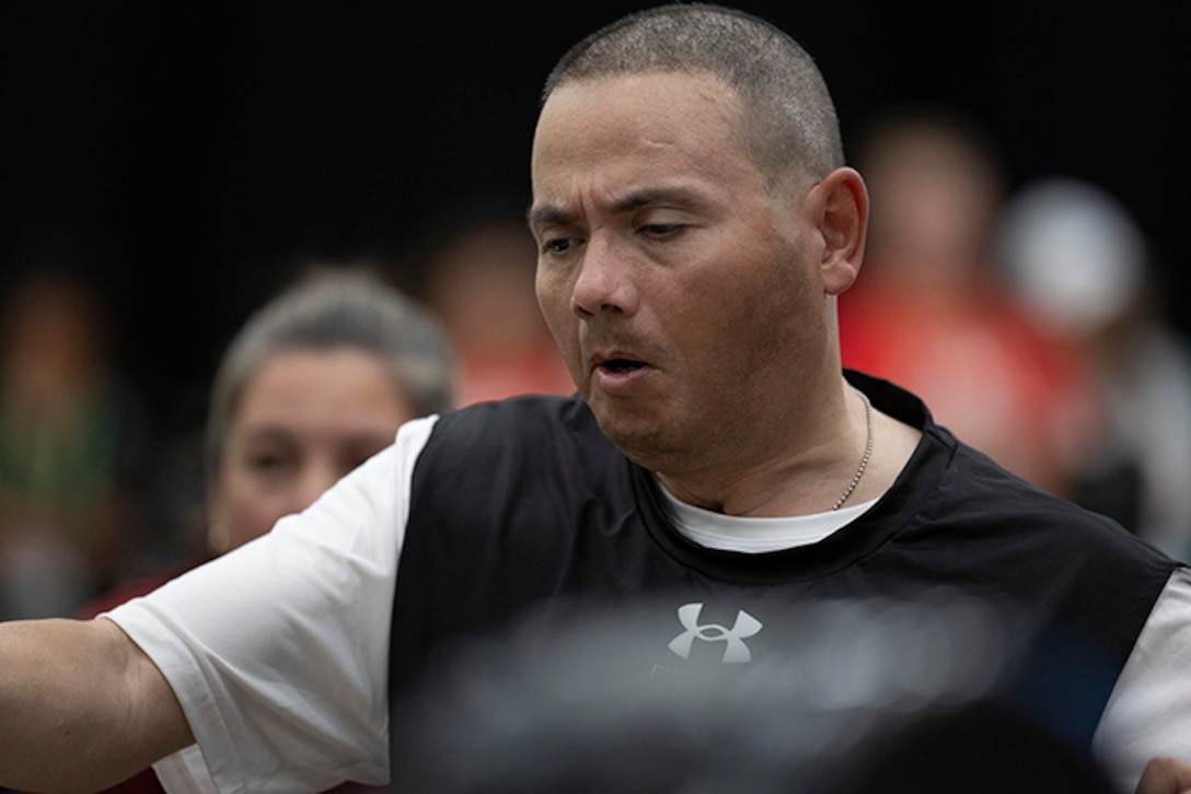 U.S. Army Capt Luis Avila focuses while competing in the indoor rowing event during the 2025 Department of Defense Warrior Games at Colorado Springs, Colorado, July 21, 2025.