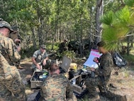 Marines from 2nd Battalion, 2nd Marine Regiment evaluating the Hydrogen Small Unit Power (H-SUP) at the Technology Operational Experimentation Exercise 22 at Camp Lejeune, North Carolina, July 27, 2022.