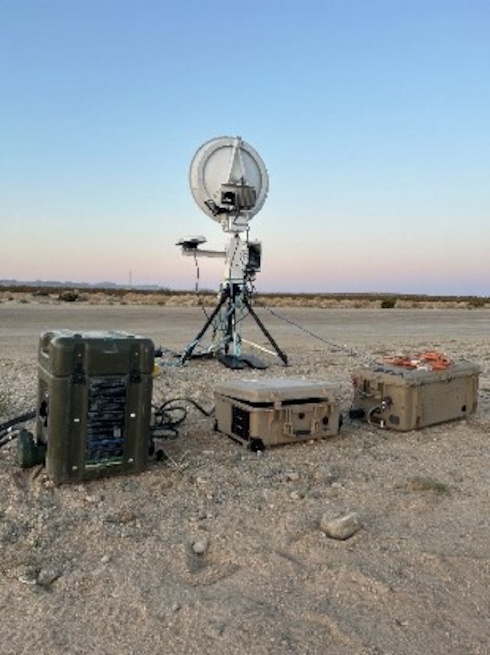 The U.S. Naval Research Laboratory (NRL) developed Hydrogen Small Unit Power (H-SUP) powering communications equipment during field testing at Marine Corps Air Ground Combat Center Twentynine Palms, Cali., May 19, 2025. The H-SUP system is a portable fuel cell electric generator with greater energy per weight than batteries and lower audible and thermal signatures than combustion generators.
