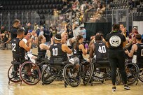 Team Army celebrates after winning their semi-final wheelchair basketball game at the 2025 Department of Defense Warrior Games in Ed Robson Arena, Colorado Springs, Colorado, July 20, 2025.