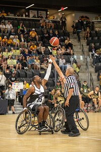U.S. Army Staff Sgt. Derrick Thompson is at center circle for the tip-off of the wheelchair basketball gold medal game at the 2025 Department of Defense Warrior Games in Ed Robson Arena, Colorado Springs, Colorado, July 20, 2025.