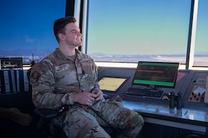 U.S. Air Force Airman 1st Class Maxwell Vincent, 563rd Operational Support Squadron air traffic control journeyman, ensures the safe, orderly and expeditious flow of air traffic at Davis-Monthan Air Force Base, Arizona, July 23, 2025. Military controllers like Vincent ensure precise communication and situational awareness to prevent conflicts and maintain mission readiness. (U.S. Air Force photo by Airman Samantha Melecio)