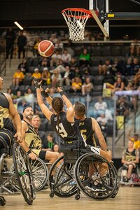 U.S. Army Retired Spc. Avery Short reaches for a rebound during the fast-paced wheelchair basketball gold medal game at the 2025 Department of Defense Warrior Games in Ed Robson Arena, Colorado Springs, Colorado, July 20, 2025.