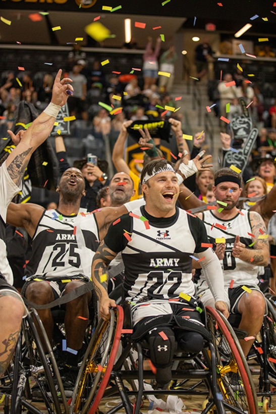 Team Army celebrates after securing the gold medal in wheelchair basketball during the 2025 Department of Defense Warrior Games in Ed Robson Arena, Colorado Springs, Colorado, July 20, 2025.