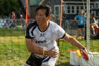U.S. Army Chief Warrant Officer 4 Joann Tsuhako prepares to throw the discus during the field event at the 2025 Department of Defense Warrior Games in Colorado Springs, Colorado, July 22, 2025.