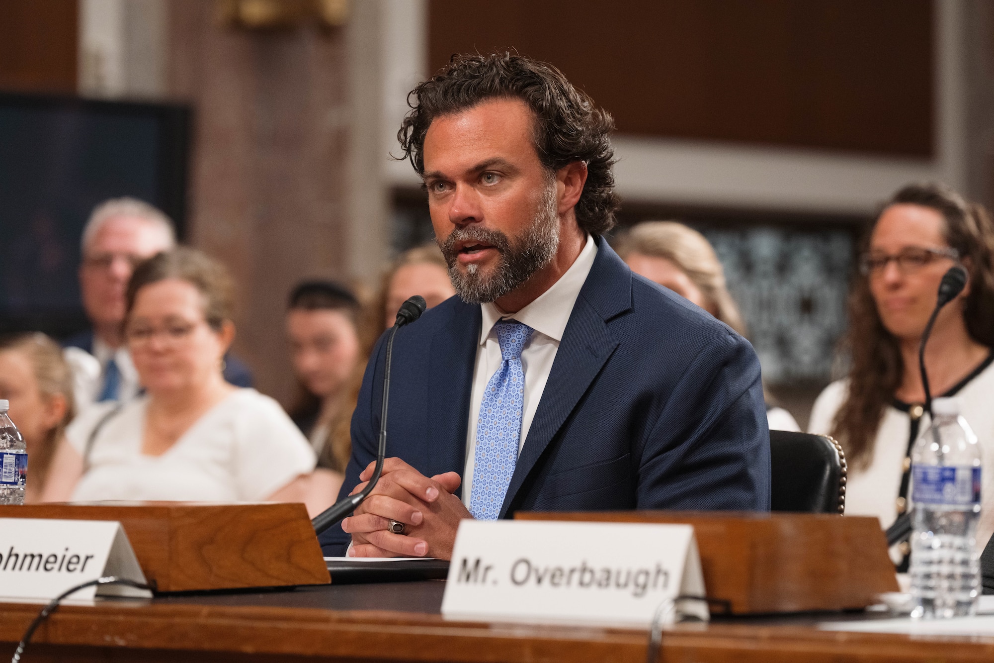   Lohmeier speaking with Senate committee.
