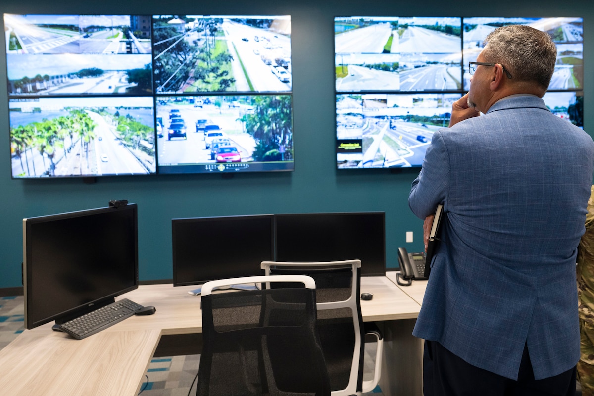 Jonathan VanNoord, deputy director of the Air Force Technical Applications Center’s 709th Support Group, observes how Brevard County uses cameras to monitor live-feeds of traffic throughout the county in the event of a major disaster or storm.  VanNoord was part of a team of subject matter experts from AFTAC who visited the Brevard County Emergency Operations Center June 24, 2025 to tour the facility and learn about their operations.   (U.S. Air Force photo by Matthew S. Jurgens)