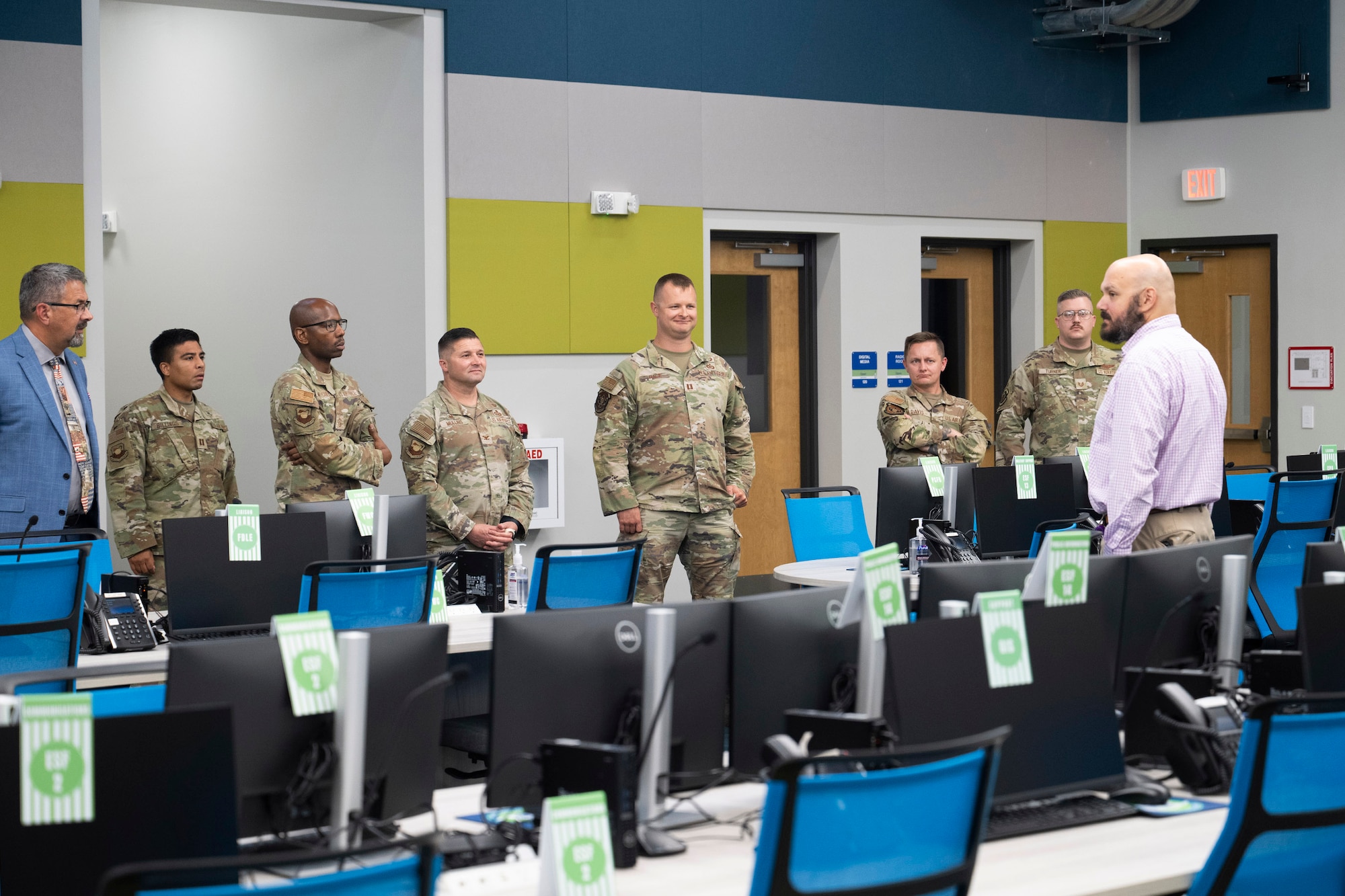 Chris Eliadis (far right), gives a tour of the Brevard County Emergency Operations Center in Rockledge, Fla., to members of the Air Force Technical Applications Center from Patrick Space Force Base, Fla., June 24, 2025.  The cadre of subject matters experts from the nuclear surveillance center visited to learn more about how the county response to emergencies and natural disasters that impact the community.  Pictured from left to right:  Jonathan VanNoord, deputy director of the 709th Support Group; Capt. Kai Billings, commander’s executive officer; Chief Master Sgt. Brian Mitchell, AFTAC Command Chief; Col. Creighton Mullins, AFTAC commander; Capt Vadim Race, 709th Support Squadron director of operations; Tech. Sgt. Dillan Davis, AFTAC emergency management representative; Tech. Sgt. Justin Turner, AFTAC EM representative; and Eliadis.   (U.S. Air Force photo by Matthew S. Jurgens)