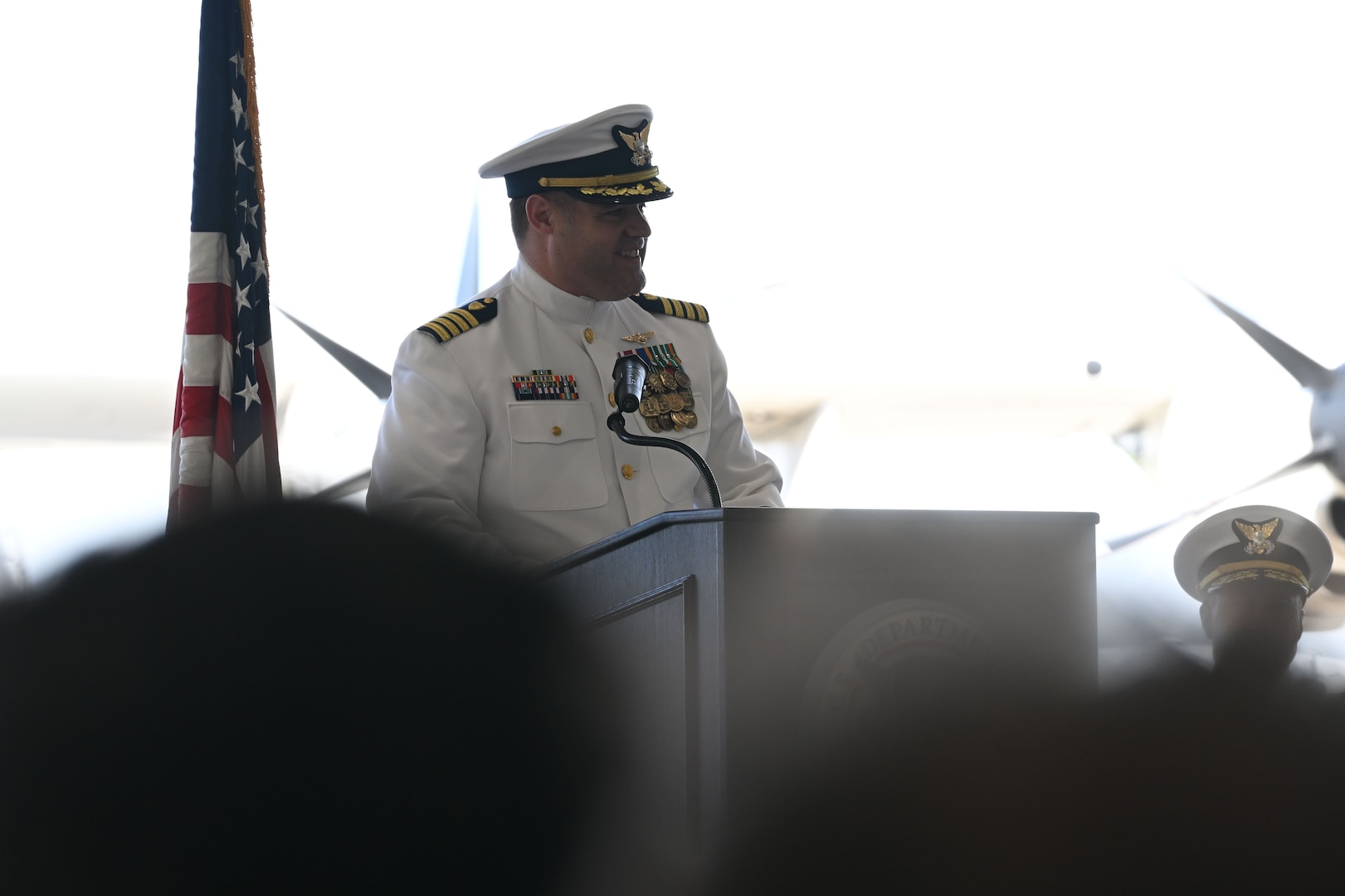 Capt. David McCown addresses members of U.S. Coast Guard Air Station Clearwater during a change of command ceremony in Clearwater, Florida, July 24, 2025. Capt. David McCown relieved Capt. Scott Phy as commanding officer of Coast Guard Air Station Clearwater during the change of command ceremony. (U.S. Coast Guard photo by Petty Officer 1st Class Riley Perkofski)