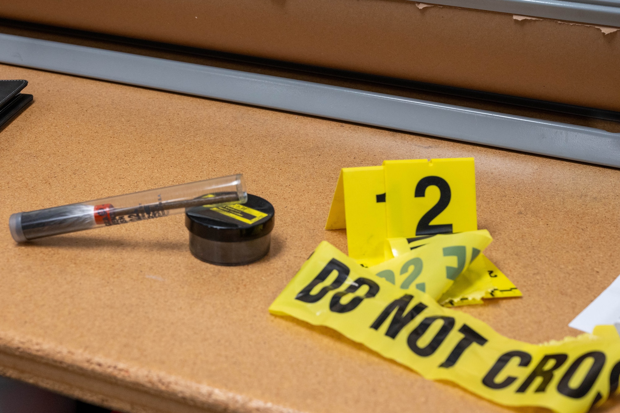 Items used by the Air Force Office of Special Investigations (OSI) during crime scene investigations are set on a table at Altus Air Force Base, Oklahoma, July 22, 2025. Even on smaller installations like Altus, AFOSI remains active in counterintelligence, fraud investigations and collaboration with local and federal law enforcement. (U.S. Air Force photo by Senior Airman Kari Degraffenreed)