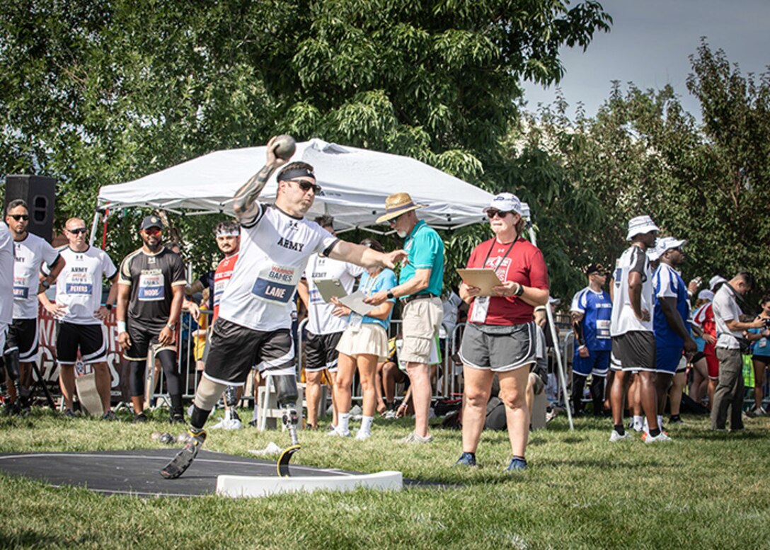 U.S. Army Retired Spc. JP Lane launches the shot put during the field event at the 2025 Department of Defense Warrior Games in Colorado Springs, Colorado, July 22, 2025.