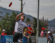 U.S. Army Retired Sgt. 1st Class Henry Escobedo throws the discus during the field event at the 2025 Department of Defense Warrior Games at Colorado Springs, Colorado, July 22, 2025.